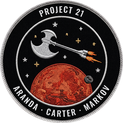 Parche bordado de la misión Project 21, con los nombres Aranda, Carter y Markov